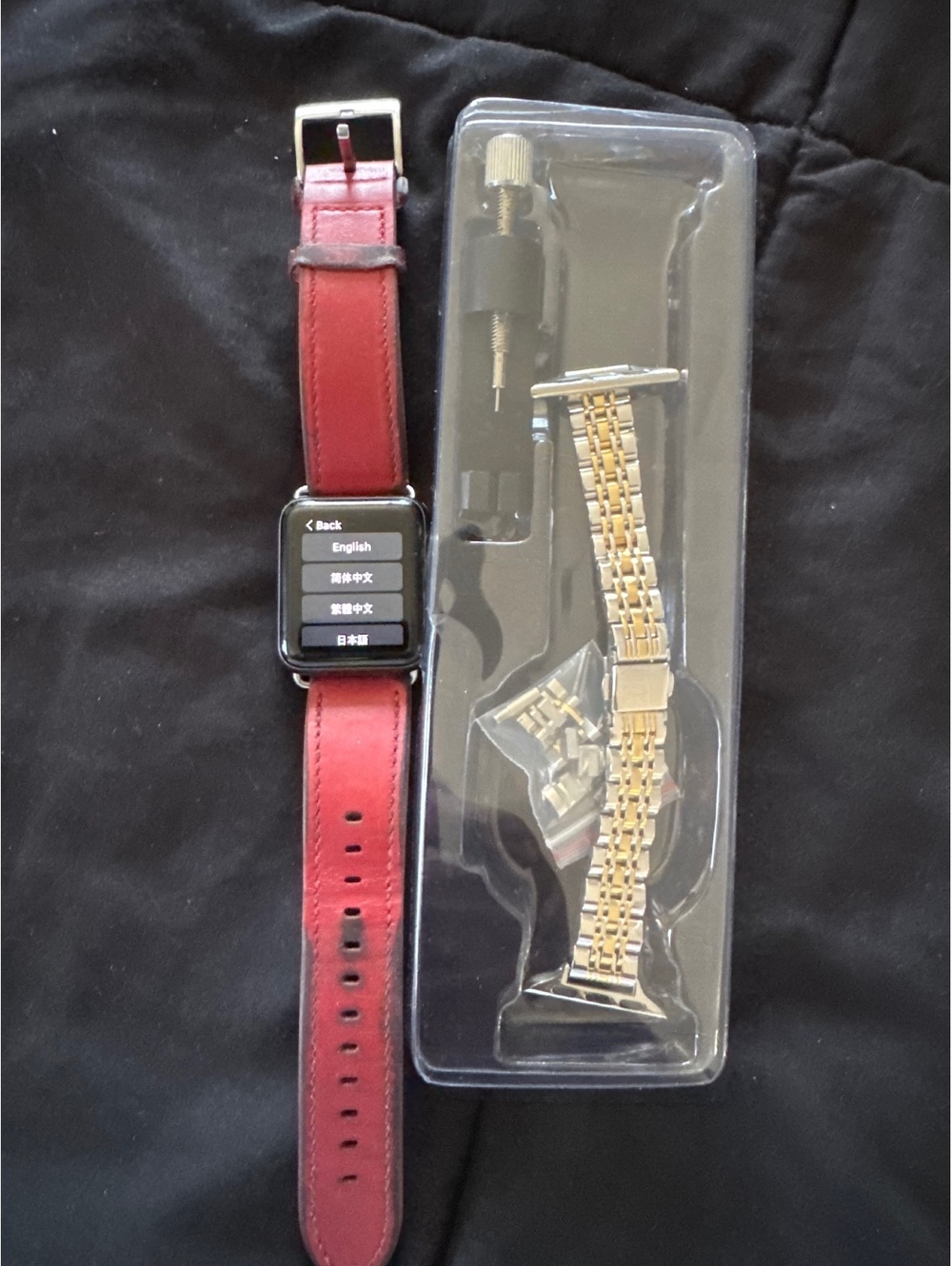 Apple Watch Series 3 38mm with red band and extra metal band